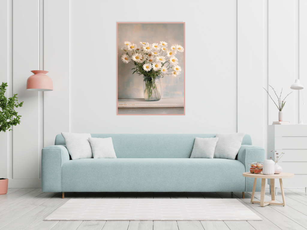 blue couch with a white rug in front of it with a prominently displayed piece of wall art behind it - art has a vase of daisies in it.